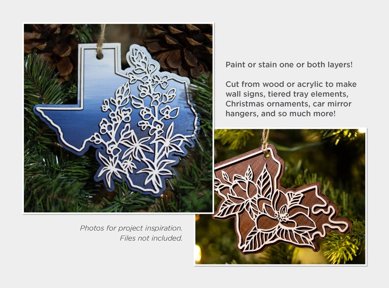 May include: Two laser cut wooden ornaments shaped like the state of Texas. One ornament is painted blue with white flowers and the other is stained brown with white flowers. The ornaments are hanging on a Christmas tree.