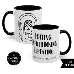 May include: Two white ceramic mugs with black accents. One mug features a black and white illustration of a microphone and headphones. The other mug has the text "EDITING. OVERTHINKING. REPEATING. THE LIFE OF A PODCASTER". Available in 11 oz or 15 oz.