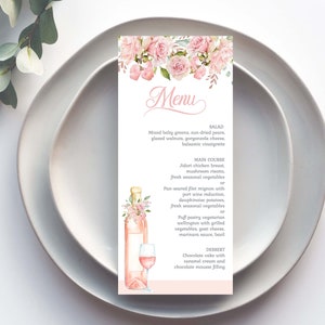 Könnte beinhalten: Eine rosa florale Speisekarte mit einem Aquarelldesign aus rosa Rosen und Grün. Die Speisekarte bietet Optionen für Salat, Hauptgericht und Dessert. Der Text auf der Speisekarte lautet: "Menu", "Salat", "Hauptgericht", "Dessert".