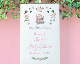 Puede incluir: Un cartel blanco con una ilustración de castillo rosa y detalles florales. El texto dice "Érase una vez... Bienvenida a la Baby Shower de Rose el 17 de septiembre de 2024".