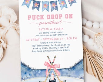 May include: A baby shower invitation with a hockey theme. The invitation features pink and blue watercolor graphics, including a hockey rink, hockey sticks, and a banner. The text reads "Puck Drop on Parenthood."