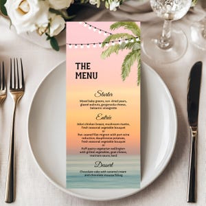 May include: A wedding menu card with a pink and orange gradient background, palm tree illustration, and string lights. The menu lists starter, entrée, and dessert options. The card is on a white plate with silverware.