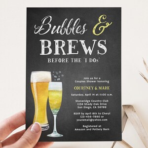May include: A black invitation card with the text "Bubbles & Brews Before the I Dos". The card features illustrations of a beer and champagne glass. The invitation is for Courtney & Mark's couples shower.