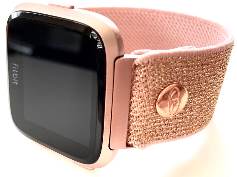 fitbit versa rose gold with white band