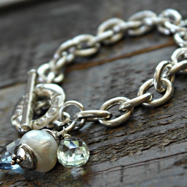 RESERVED for Petra Bold .925 Sterling Silver Bracelet with a twist & Pearl