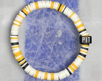 Pulsera unisex de colores del equipo de hockey de Pittsburgh: blanco, amarillo y negro.