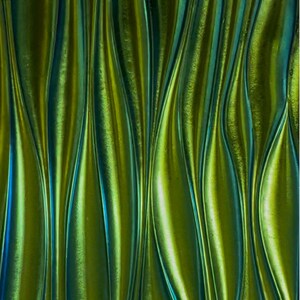 May include: A close-up of a green and blue metallic surface with a wavy, rippled texture. The surface has a shiny, iridescent finish.