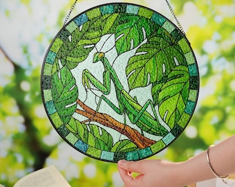Acchiappasole in vetro a forma di mantide religiosa, ideale per gli amanti della natura.