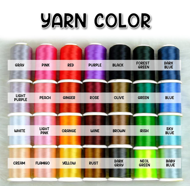 Puede incluir: Una carta de colores de carretes de hilo en varios colores, incluyendo gris, rosa, rojo, morado, negro, verde y azul. Cada carrete est&aacute; etiquetado con su nombre de color. El texto "YARN COLOR" est&aacute; en la parte superior.