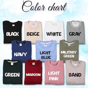 Puede incluir: Una carta de colores que muestra varios colores de sudaderas. La carta incluye negro, beige, blanco, gris, azul marino, azul claro, verde militar, verde, granate, rosa claro y arena. Cada sudadera tiene su nombre de color en texto blanco en negrita.
