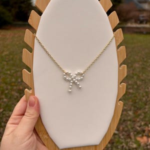 pearl bow necklace