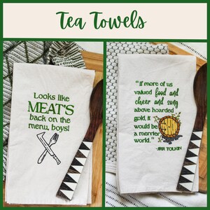 An unbleached off white linen tea towel embroidered with a quote from Lord of the Rings movie, the Two Towers. The Quote is Potatoes. Boil 'em, mash 'em, stick'em in a stew. Playful potatoes fall down to a  large whimsical pot, and a classic potatoes masher. The fonts represent the verbs, with steam coming off of the boil em phrase and the letters in mashed closely pushed together. Colors are a bold emerald green and a soft golden brown. Hang this towel in kitchen of any hobbit, elf, or wizard.