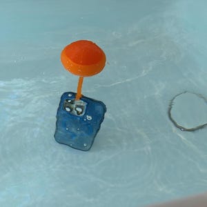 3D-geprinte oranje telefoonboei: varen of drijvend strandwateraccessoire