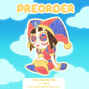 May include: A hard enamel pin featuring a jester character with a red and blue hat, circular red and blue eyes, and a small tongue sticking out. The pin is 1.4 inches, gold-toned, and labelled as a preorder with a production time of 8-10 weeks.