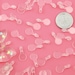 Michele Hyman reviewed Plastic Bails - 15mm Clear Round Transparent Plastic Bails - make cabochons into charms - 100 pc set
