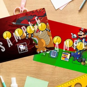 May include: Two game boards with red and green backgrounds. The red board features a cartoon Bowser character and the green board features a cartoon Mario character. Both boards have gold coins and other game elements.