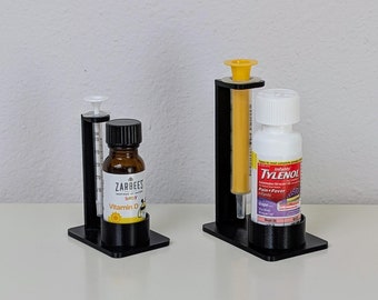 Portabotellas y jeringas pequeñas: portamedicamentos/vitaminas para bebés