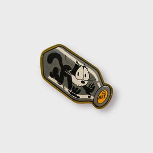 Handgemaakte Felix the Cat Trapped in Milk-flespen – schattig cartoonaccessoire van krimpplastic