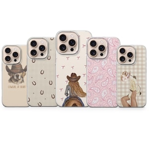 May include: Five smartphone cases featuring western-themed designs. The first shows a dog in a cowboy hat with the text 'COWGIRL AT HEART'. Others display horseshoe patterns, a person on horseback, pink paisley prints, and cowboy boots on legs.
