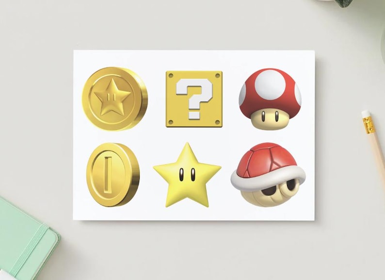 May include: A white card featuring six colorful icons from the Super Mario video game series. Includes a gold coin with a star, a yellow question mark block, a red and white mushroom, a gold coin, a yellow star, and a red turtle shell.
