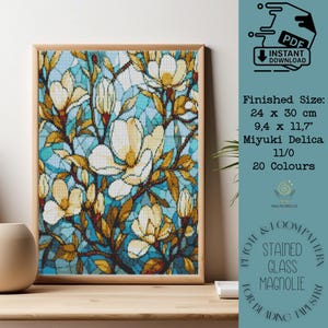 May include: A framed stained glass pattern with a floral design of white and yellow magnolia flowers on a blue mosaic background. The finished size is 24 x 30 cm. The pattern is for beading and includes 20 colours.