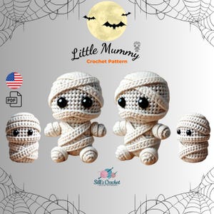 May include: Crochet pattern for making three mummy dolls. The dolls are white and have black eyes. The pattern is called "Little Mummy Crochet Pattern".