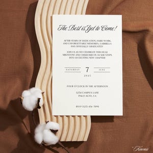 Graduation Celebration Invitation Card with RSVP. The card is resting on an organic shaped curved carved wooden board with cotton beside it and a brown fabric underneath. By Kewasi Designs