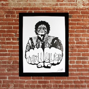 May include: Black and white illustration of Michael Jackson with the word "THRILLER" spelled out on his knuckles.