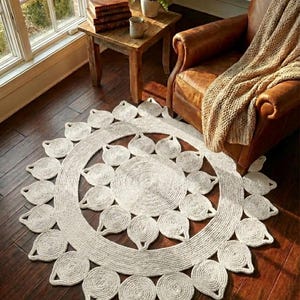 Tappeto rotondo in juta, con motivo a sole, lavabile, in fibra naturale, ideale per arredamento rustico boho.
