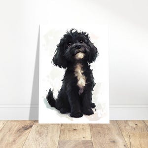Peut inclure: Impression sur toile encadrée représentant un chien noir et blanc au pelage touffu. Le chien est assis et regarde vers le haut avec une expression joyeuse. L'œuvre d'art est de style pictural, sur fond clair.
