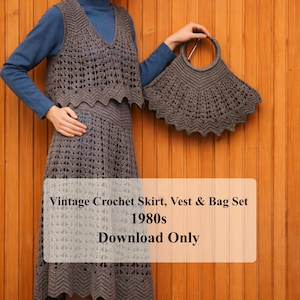 May include: A vintage crochet skirt, vest, and bag set in gray. The vest has a V-neck and a scalloped hem. The skirt is a midi length. The bag has a circular handle and a fan-shaped body. The text on the image says "Vintage Crochet Skirt, Vest & Bag Set 1980s Download Only."