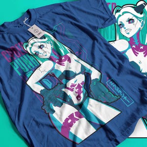 May include: A blue t-shirt with a graphic of a female anime-style character with teal hair and accents. The shirt has the words "CYBER PUNK" printed on it. The design incorporates white, teal, and purple colours.