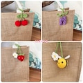 Crochet flower bag charm, crochet sunflower/ lavender/ cherry/ strawberry/ lemon/bee bag charm, bag decor, gift for lovers, gift for women product logo
