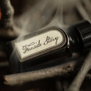 Fireside Story™ Natural Perfume Oil bonfire, campfire, smoke, fireplace, woods, and vanilla unisex scent 10 Millilitres