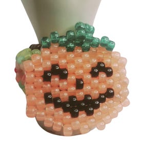 Glow-n-Dark Orange Pumpkin  On a Glow Kandi Cuff EDM Stretchy Bracelet