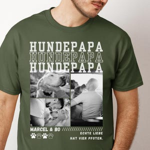 May include: Olive green t-shirt with the text "HUNDEPAPA" in white block letters. Below the text are four black and white photos of a dog and a person. The text "MARCEL & BO" and "ECHTE LIEBE HAT VIER PFOTEN" are also visible.