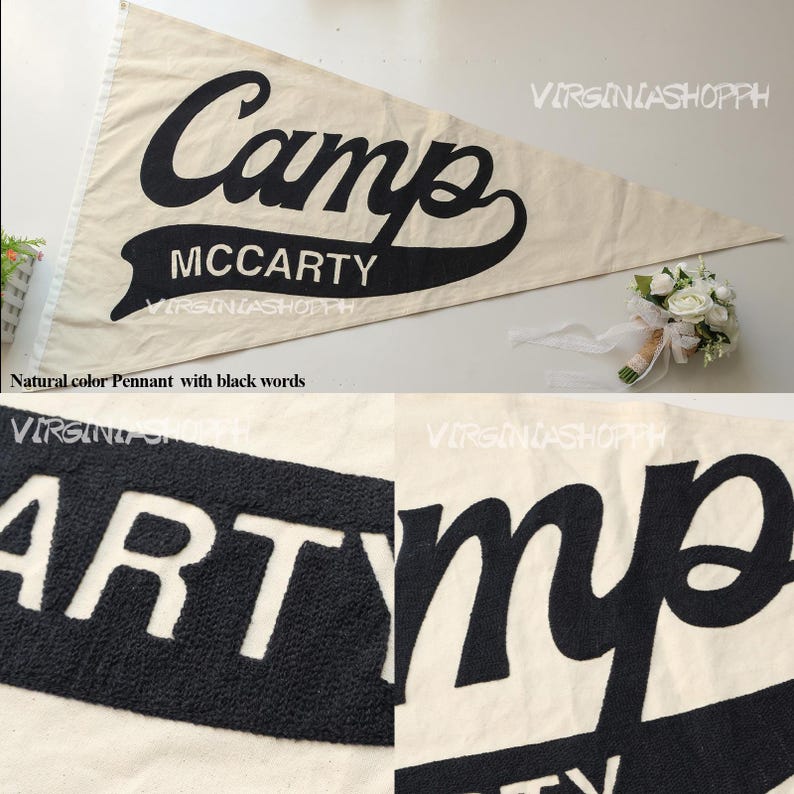 May include: A triangular off-white pennant featuring the black text Camp MCCARTY in a script and block font combination. The lettering has a textured, raised appearance. The design includes a banner shape behind the word MCCARTY.