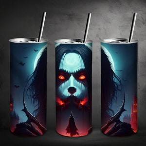 May include: Three stainless steel tumblers with a graphic of a vampire with glowing red eyes and a dark castle in the background. The tumblers are a dark blue color with a white moon in the background.