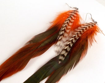 Wild Thang Feather Earrings  orange gizzzly