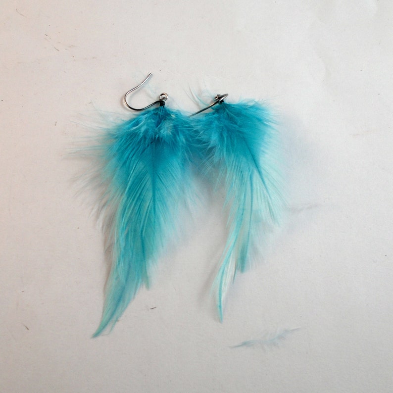 extra small baby blue feather earrings dangler natural feathers image 2
