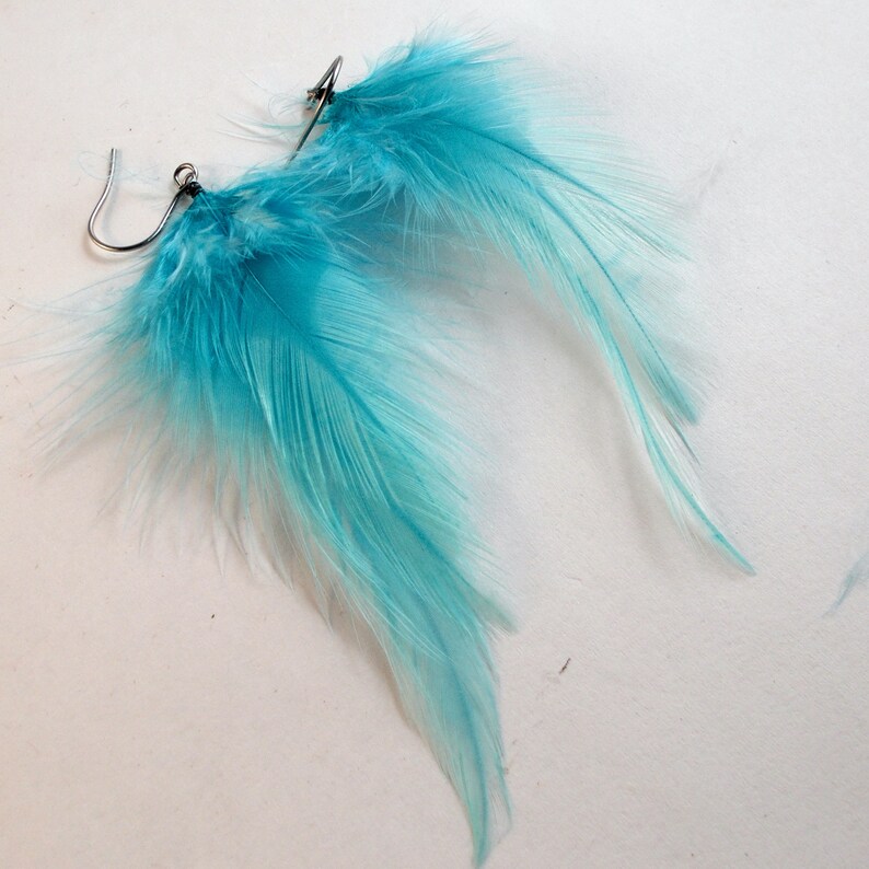 extra small baby blue feather earrings dangler natural feathers image 1