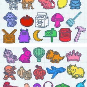 May include: A collection of colorful, cartoon-style STL files featuring various shapes and objects. The designs include a mummy, camel, mouse, lemon, gnome, monkey, tomato, milk carton, mushroom, broom, drum, monster, moon, mailbox, jam jar, hammer, unicorn, rabbit, hot air balloon, dinosaur, crown, ninja, onions, clown, airplane, rhino, train, nose, number nine, necklace, nest, and narwhal.