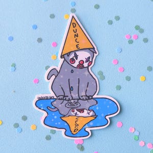 Adesivo de gato palhaço idiota triste