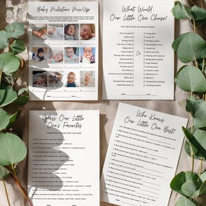 May include: Four white paper sheets with black text for a baby shower. The sheets include the phrases "Baby Milestone Mix Up", "What Would Our Little One Choose?", "Guess Our Little One's Favorites", and "Who Knows Our Little One Best!"
