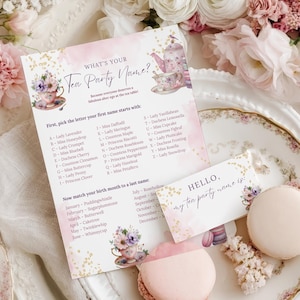 May include: A tea party game card with a floral design and the text "WHAT'S YOUR Tea Party Name?". The card includes a list of names and a matching system. A small card reads "HELLO, my tea party name is:" with a macaron.