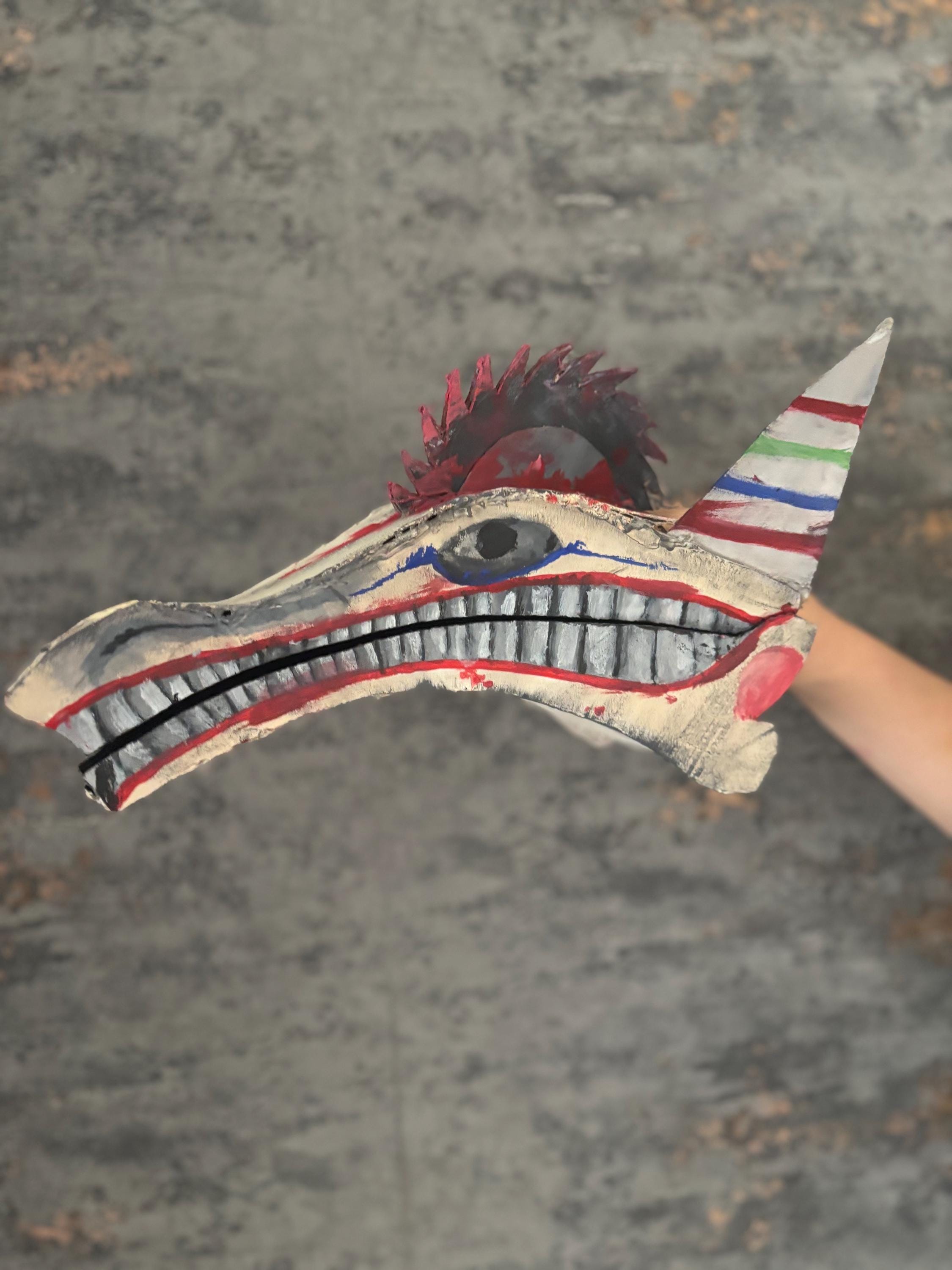 creepy clown dragon puppet
