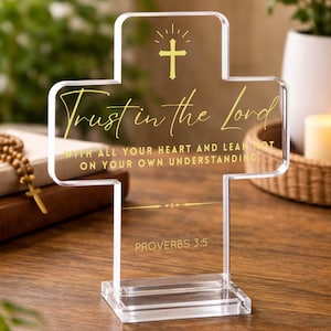 May include: A rustic wooden sign with the text "Welcome to our home" in white lettering. The sign features a distressed finish and a simple, inviting design, perfect for front door decor.