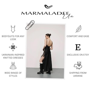 May include: A black satin dress with lace detailing and a high slit is featured in this image. The dress is part of a collection that includes bodysuits and Ukrainian-inspired knitted dresses. The brand name "MARMALADEE" is displayed at the top.