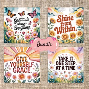 May include: A bundle of four square art prints with inspirational quotes. The prints feature watercolor illustrations of flowers, butterflies, and rainbows. The quotes include "Gratitude changes Everything," "Shine from Within," "Give Yourself Grace," and "Take it One Step at a Time."