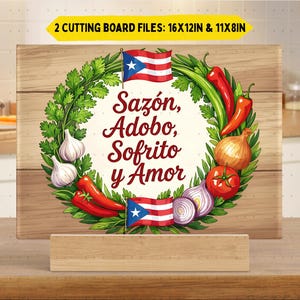 May include: A rectangular cutting board with a wooden texture, featuring a wreath of vegetables and the Puerto Rican flag. The wreath surrounds the words "Sazón, Adobo, Sofrito y Amor." The board is 16x12 inches and 11x8 inches.
